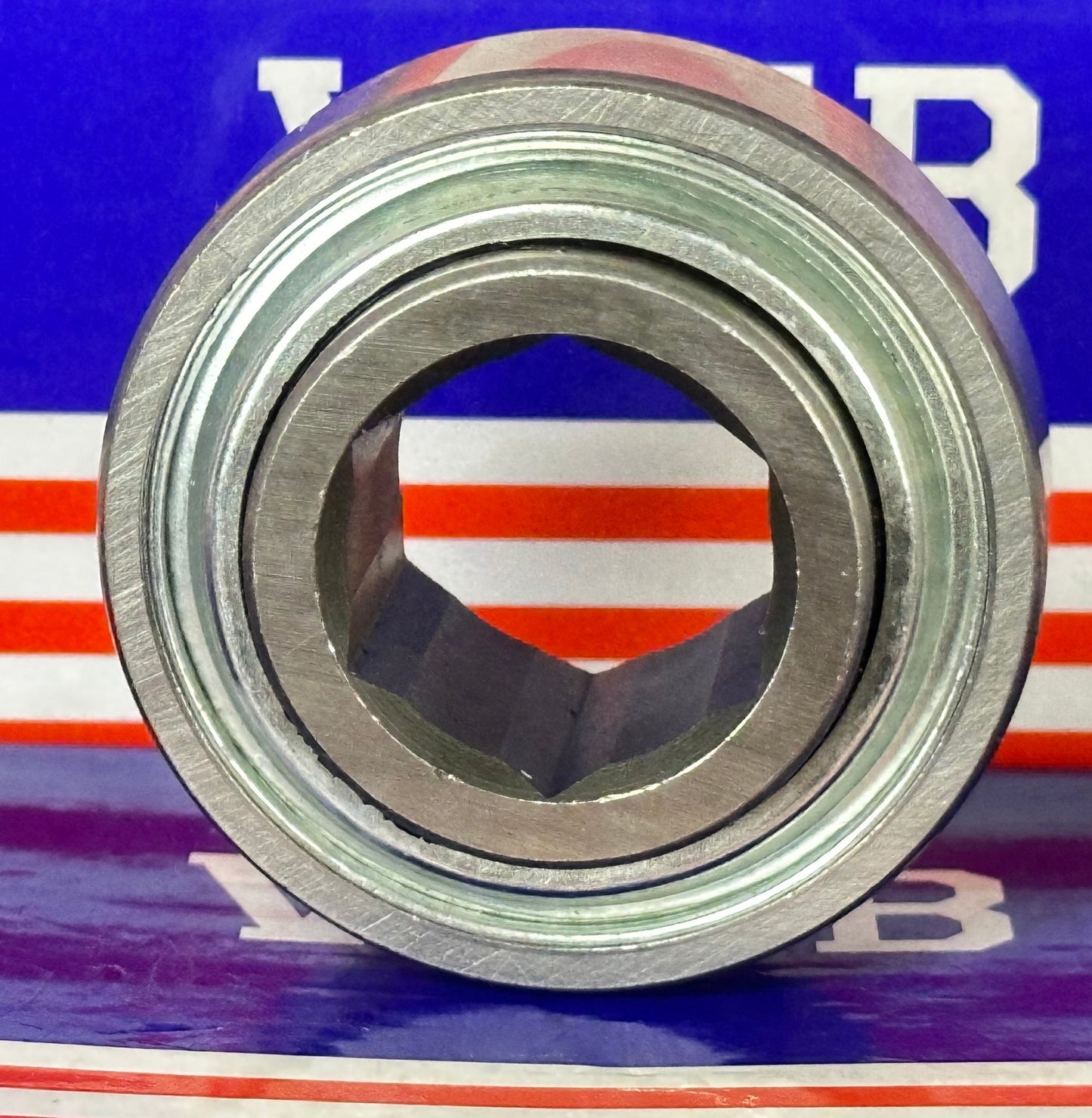 205KRR2 Agricultural Machinery bearing - Two Single lip Seals & Hex bore & Cylindrical OD