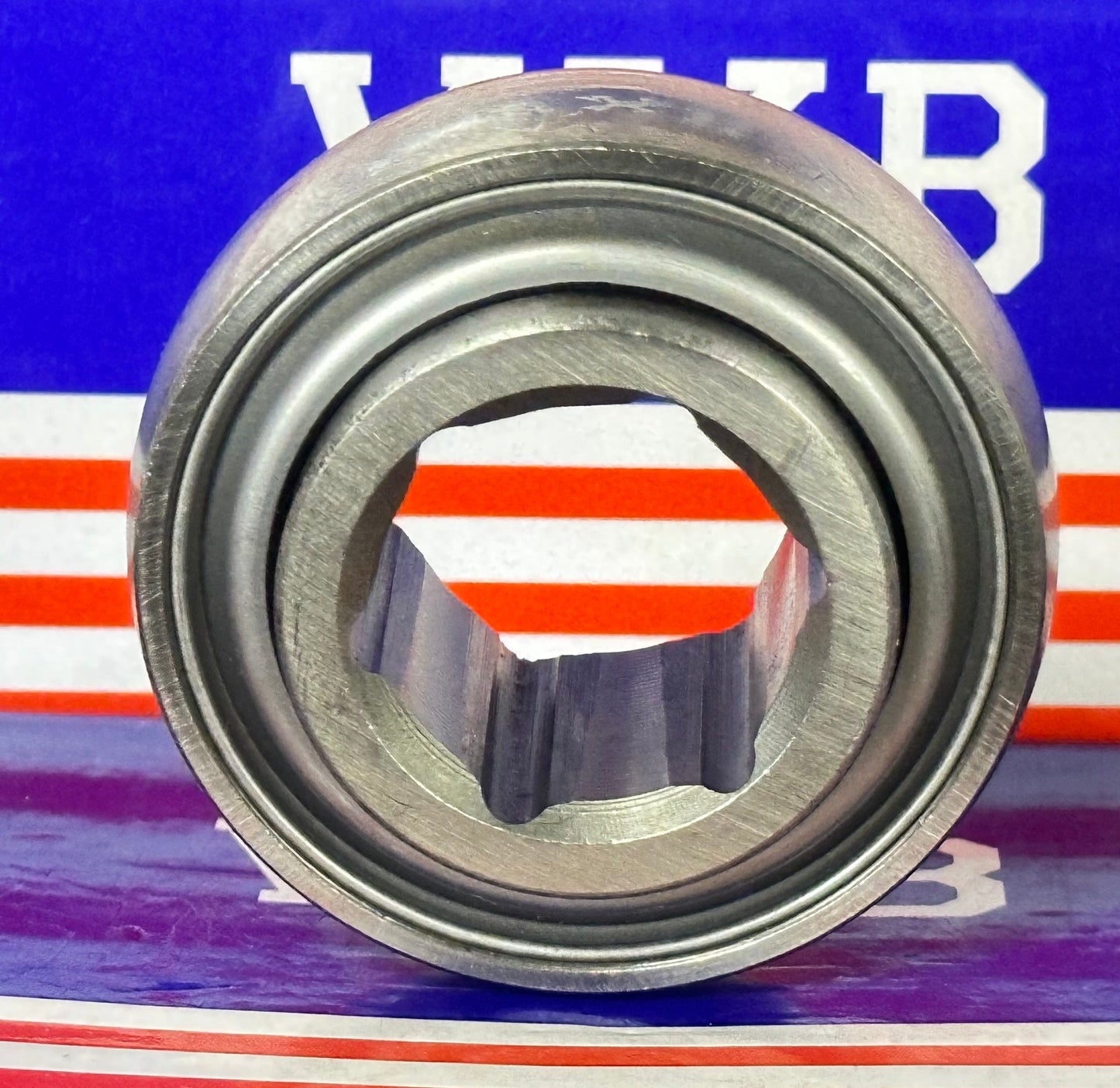 205KRRB2 Agricultural Machinery bearing - Two Single lip Seals & Hex bore & Spherical OD