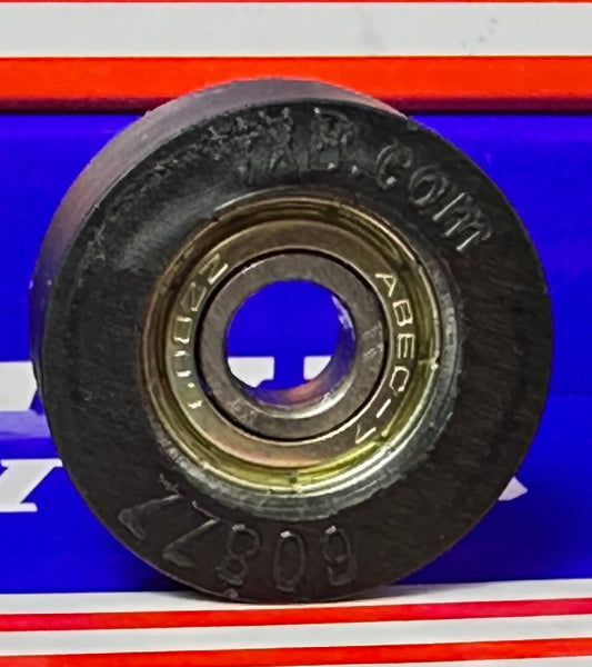 8mm Bore Bearing - 1-1/4" inch Black Tire 8mm x 1-1/4" x 1/2"